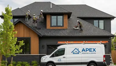 Roof repair experts fixing vinyl siding and shingles in Greenville, NC for Next Level Exteriors