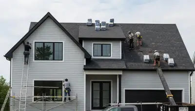 Roof replacement experts installing durable vinyl siding in Greenville, NC homes